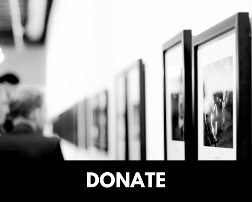 A button for the donation page. A blurred, black and white image of paintings lining a wall.